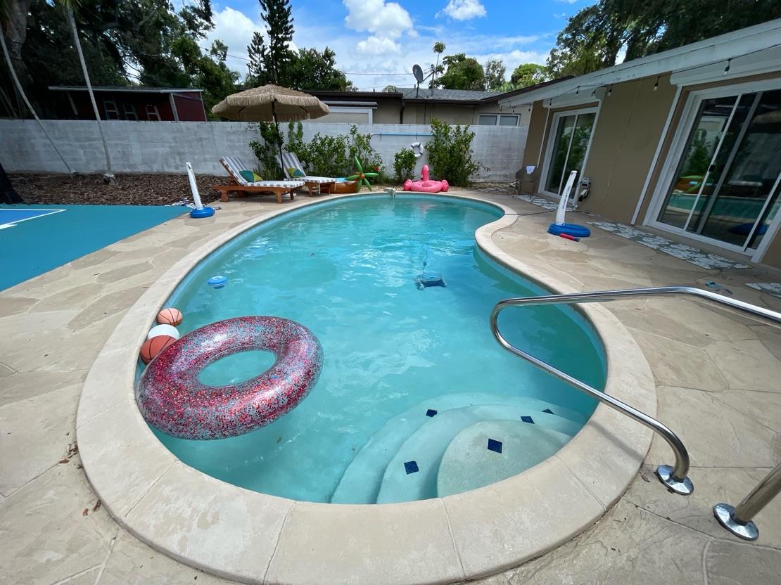 Happy Pool Care Pros work